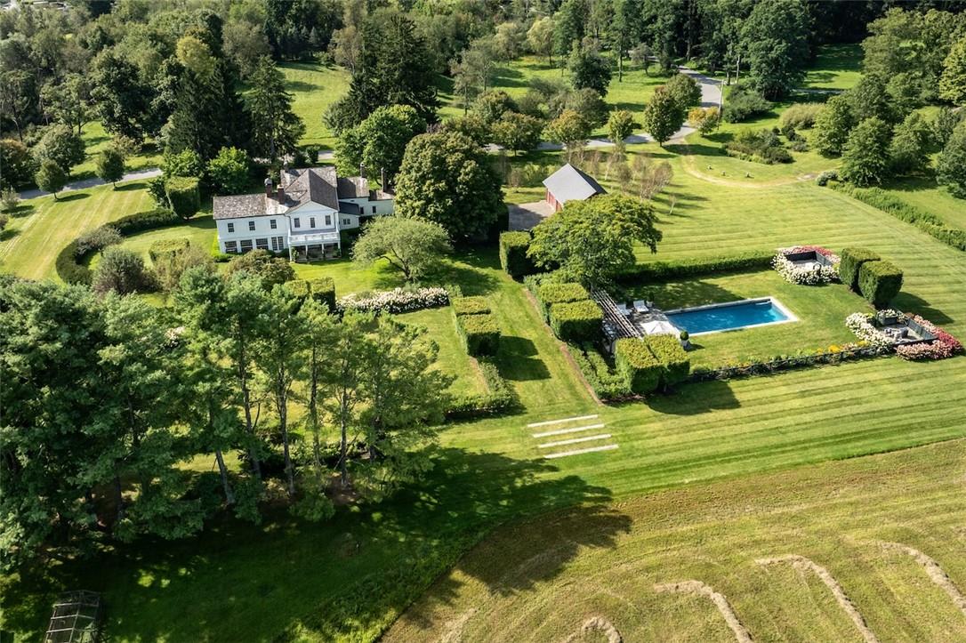 a view of a houses with swimming pool