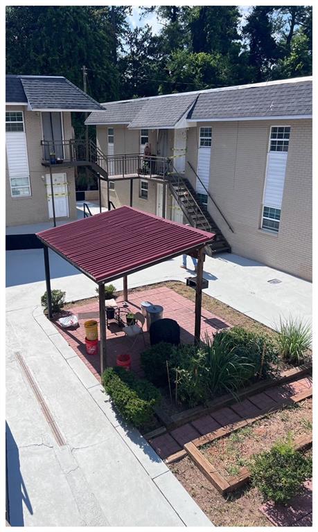 a view of a terrace with sitting area