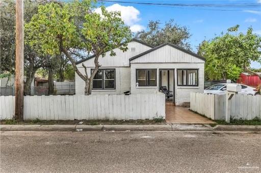 a front view of a house with a garage