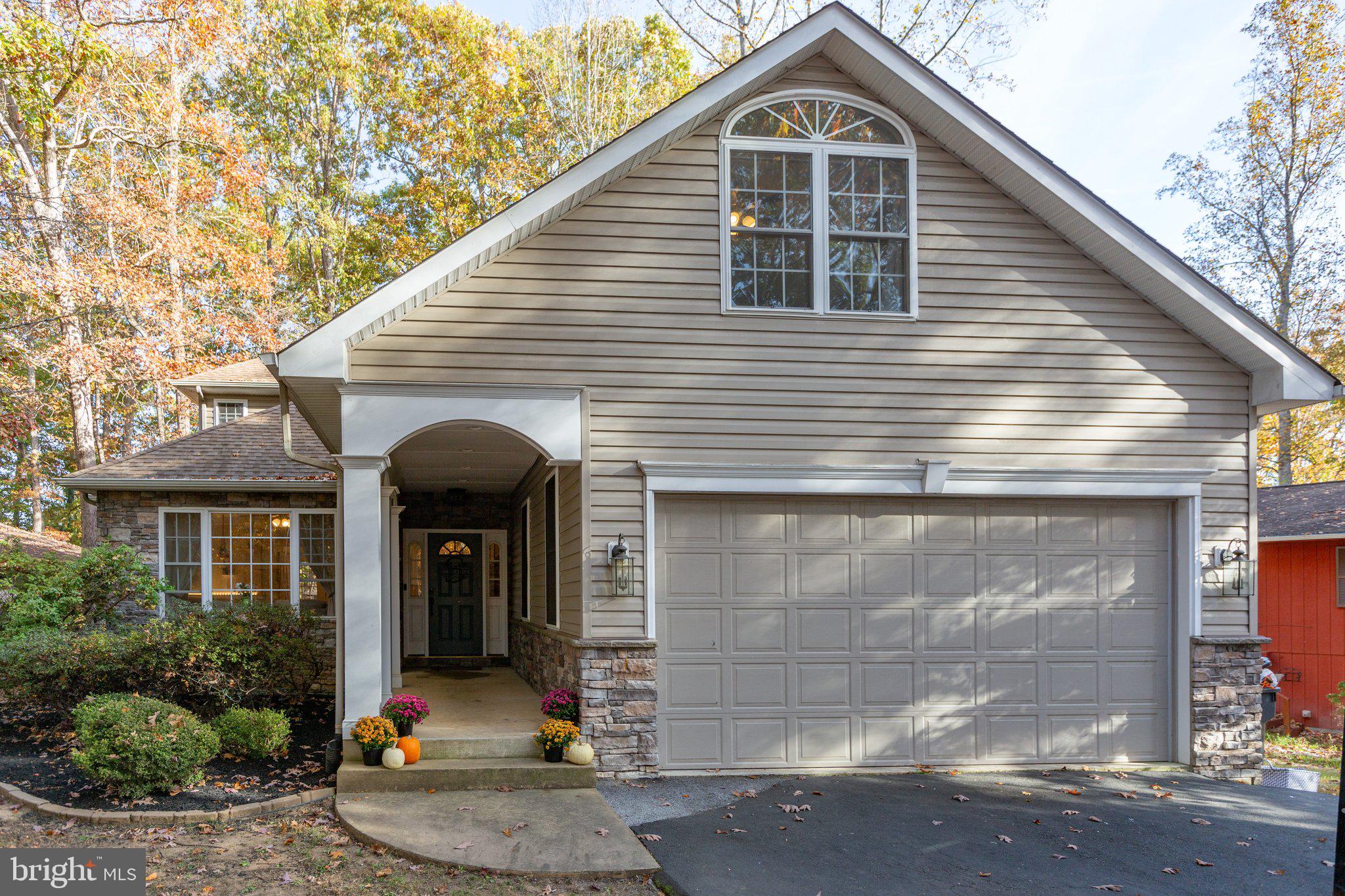 a front view of a house with entertaining space