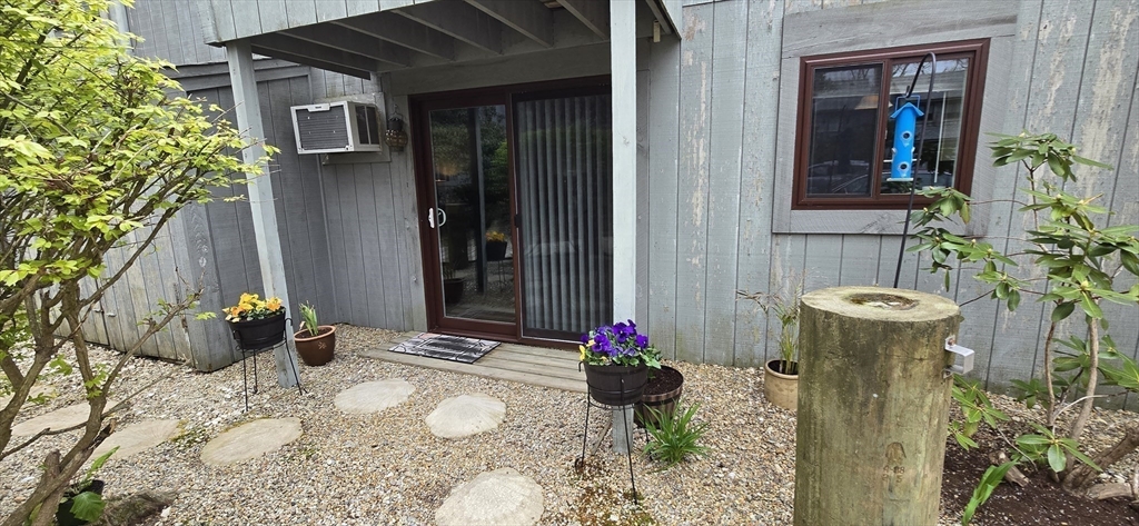 a front view of a house with patio