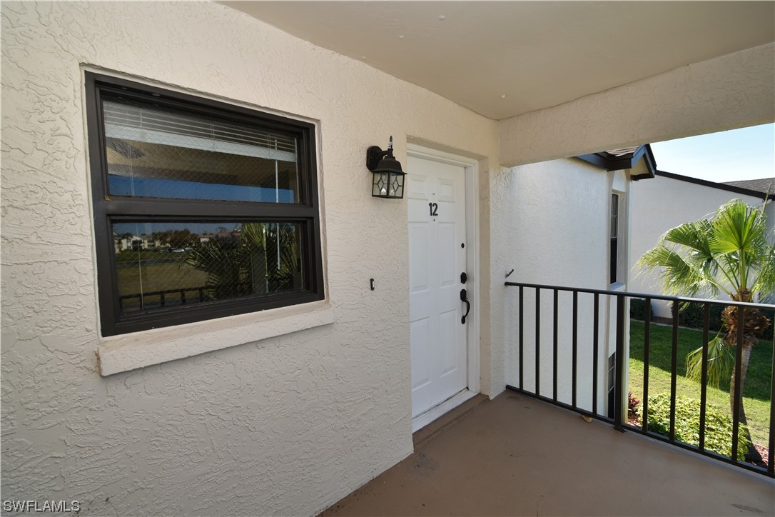 a view of a porch of a house