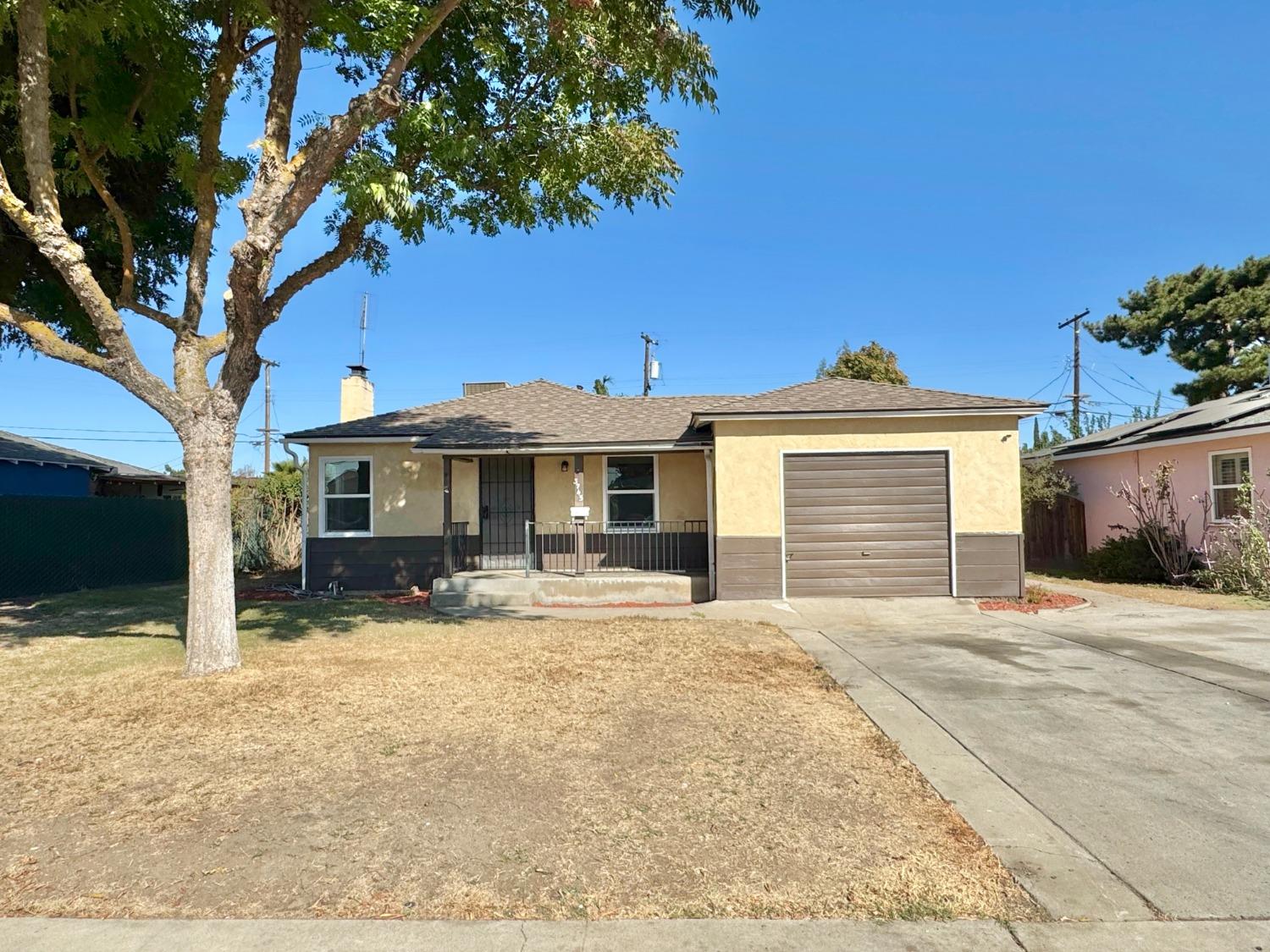 a front view of house with a yard