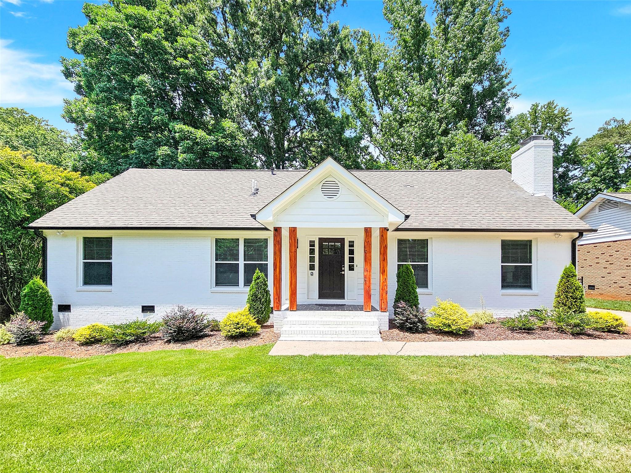 front view of house with a yard