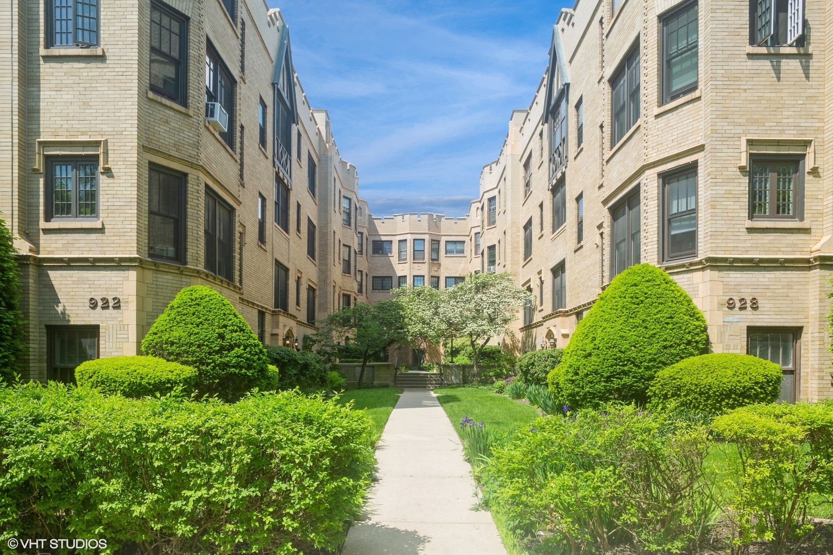 a view of a building with a garden