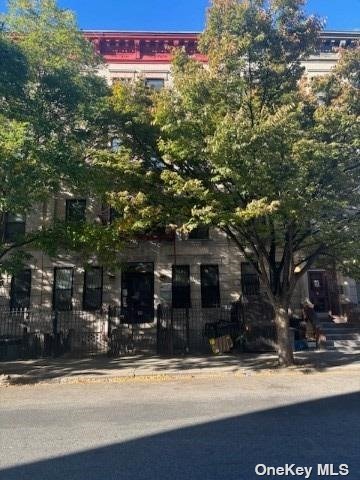 a front view of a building with street