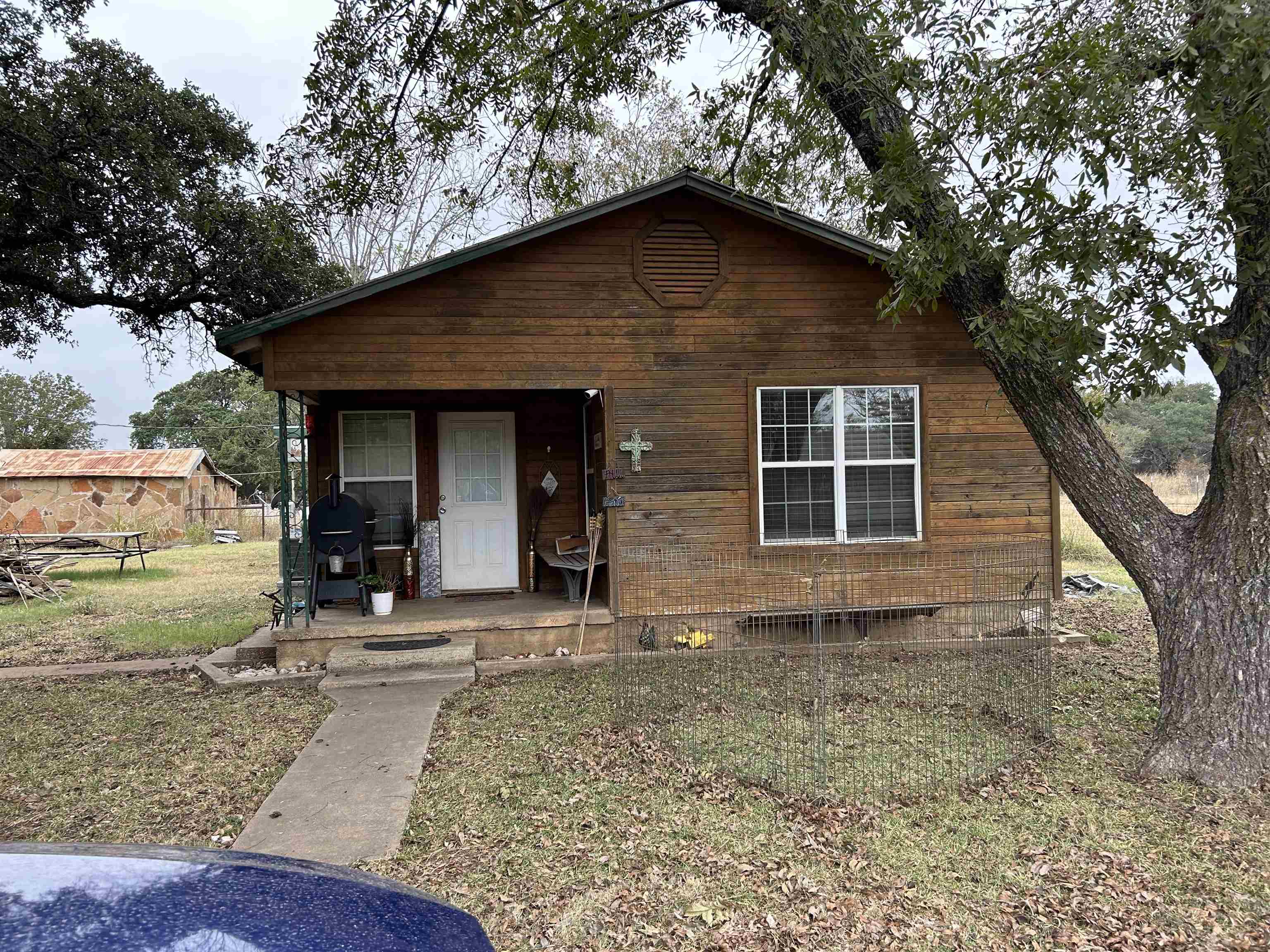 a house with yard in front of it