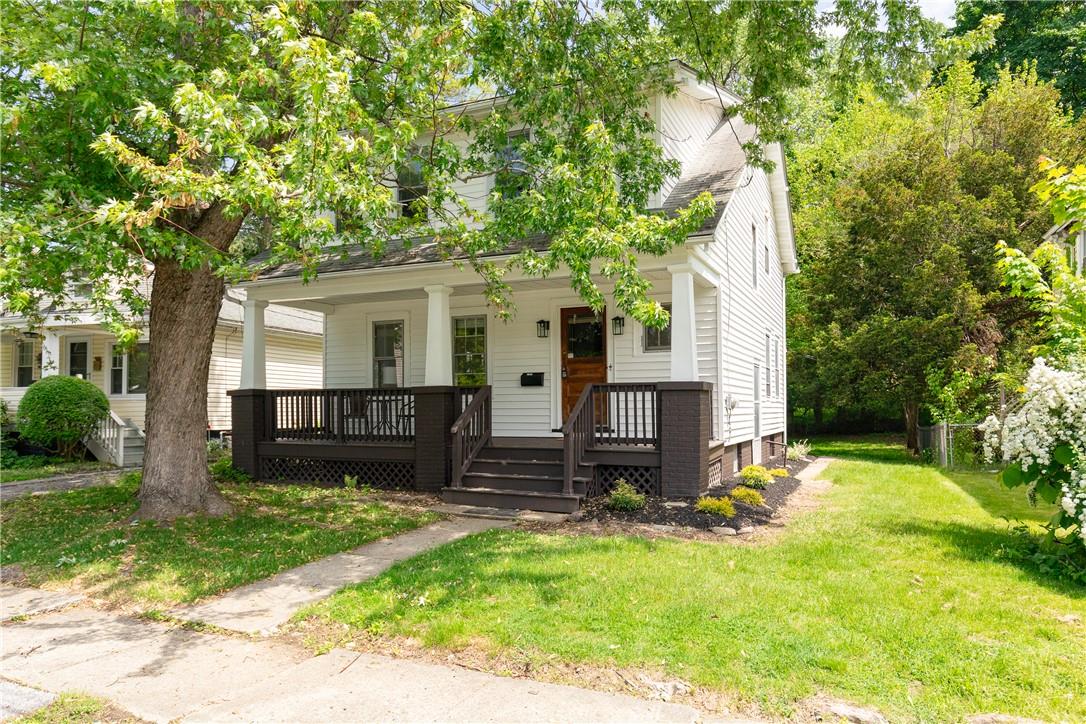 front view of a house with a yard