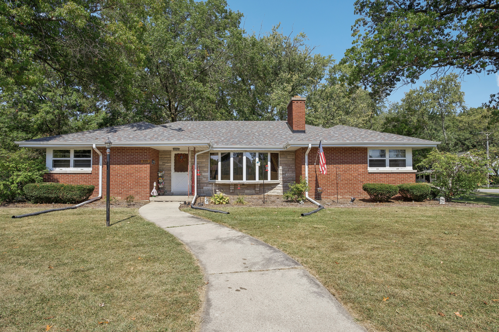 front view of a house with a patio