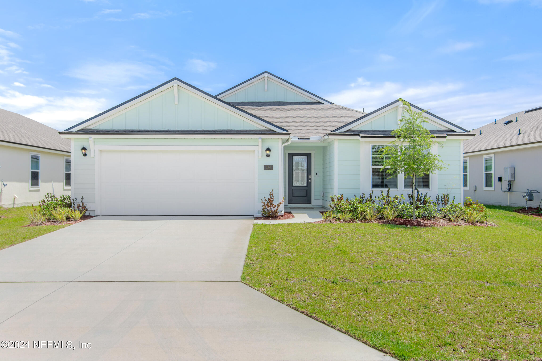 a front view of house with yard