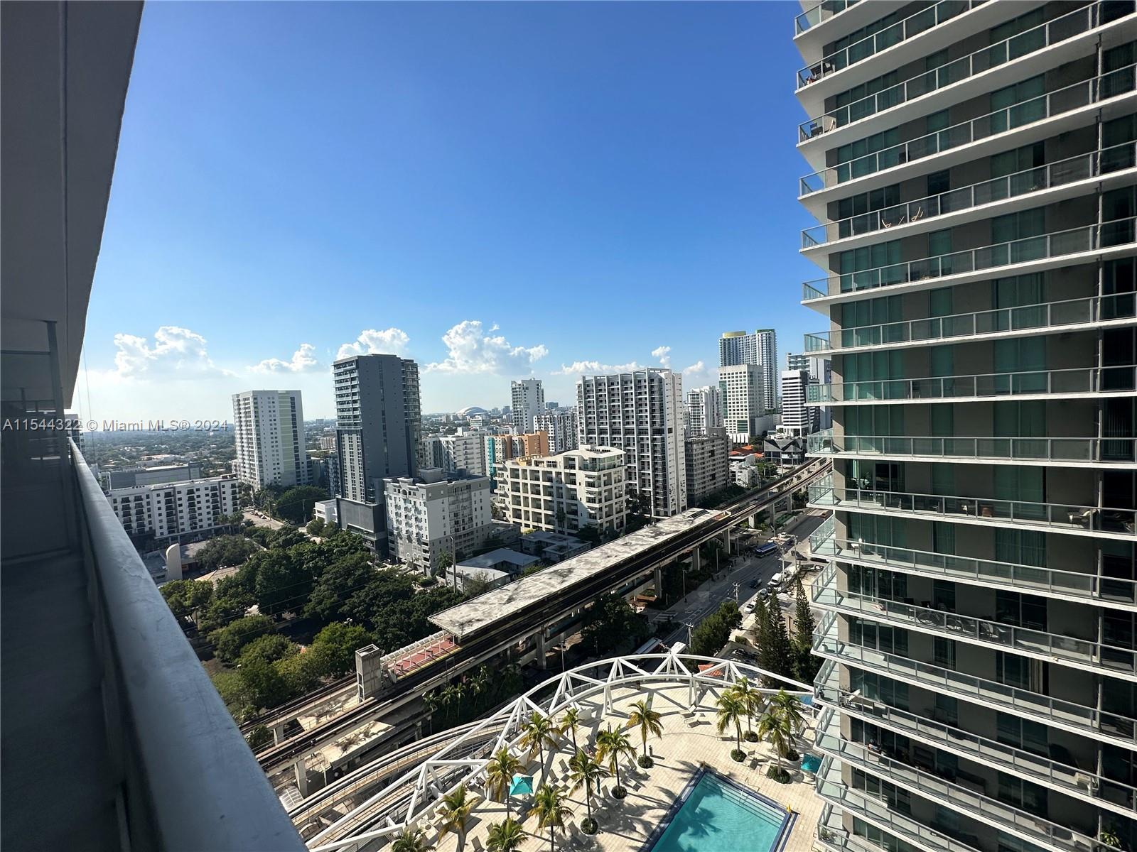 a view of a city with tall buildings