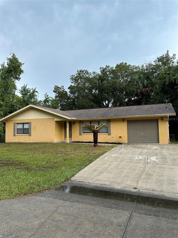 front view of house with a yard