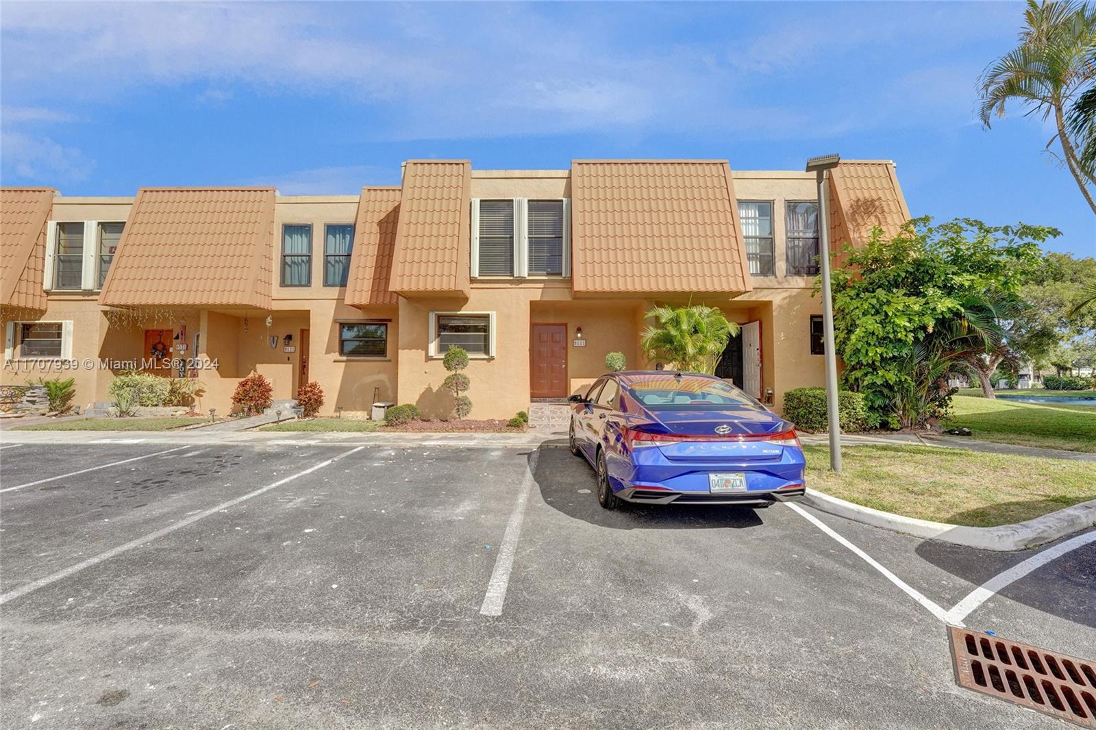 a car parked in front of a house