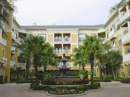 a front view of a building with garden