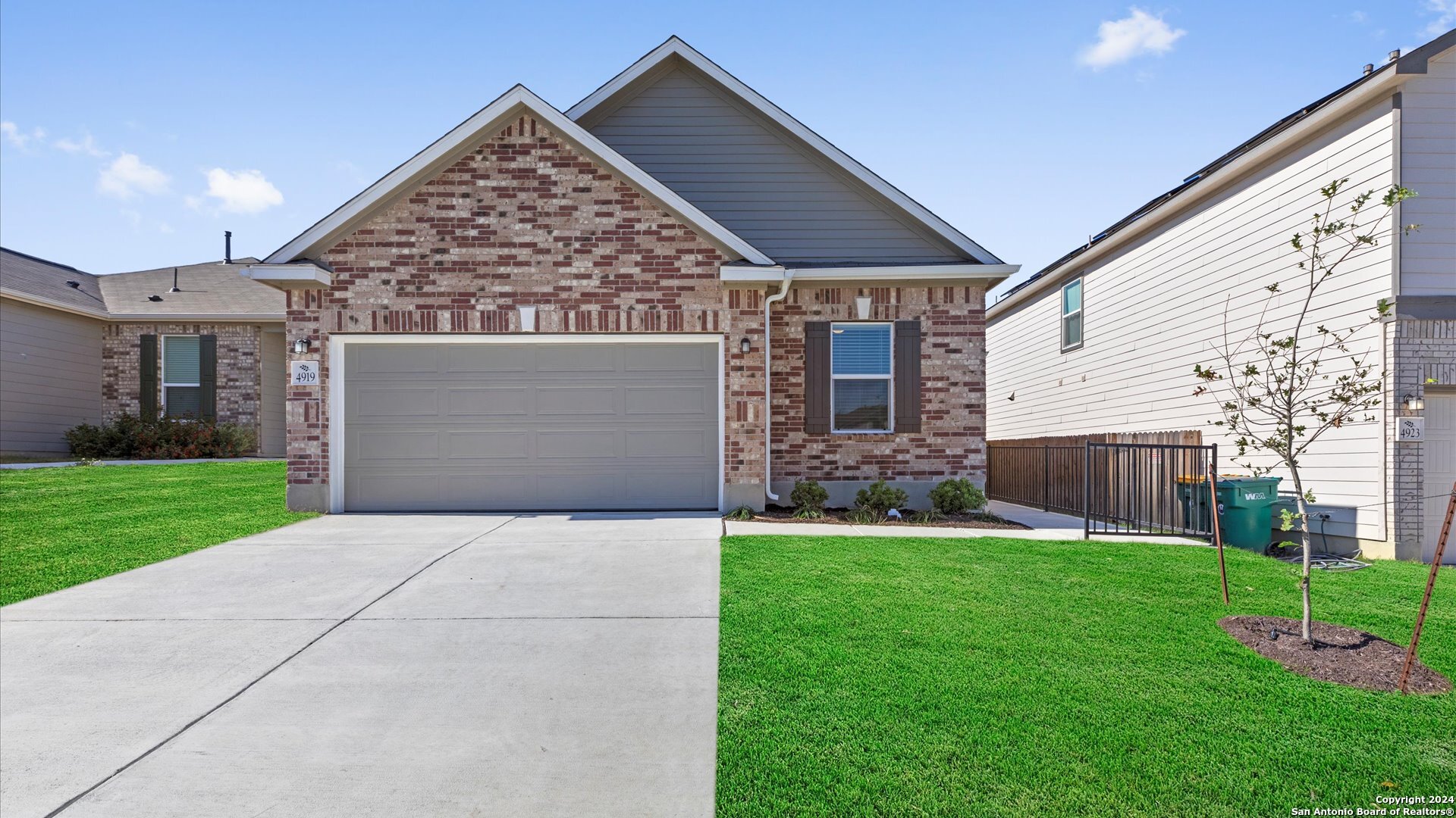 a front view of house with yard