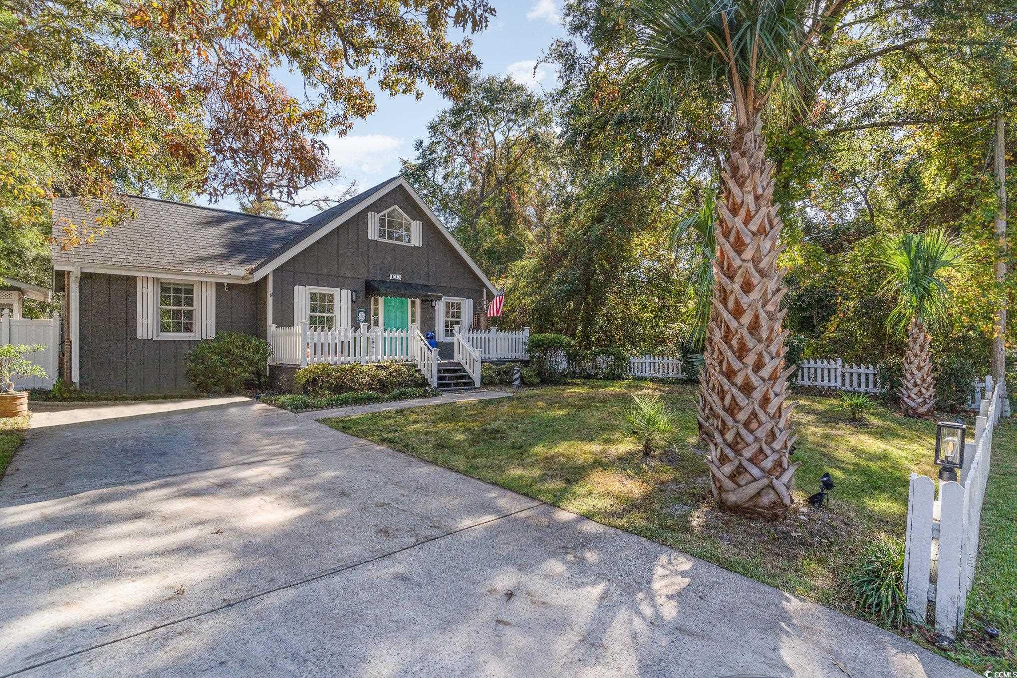 View of front of property featuring a porch and a