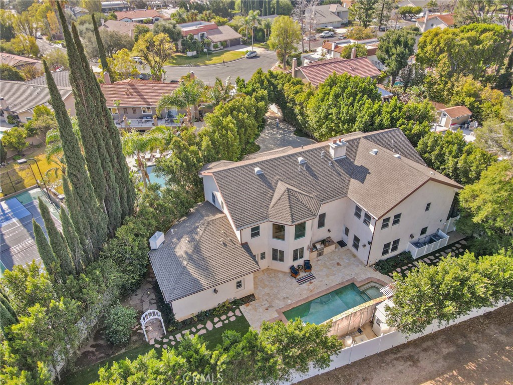 an aerial view of a house with a garden