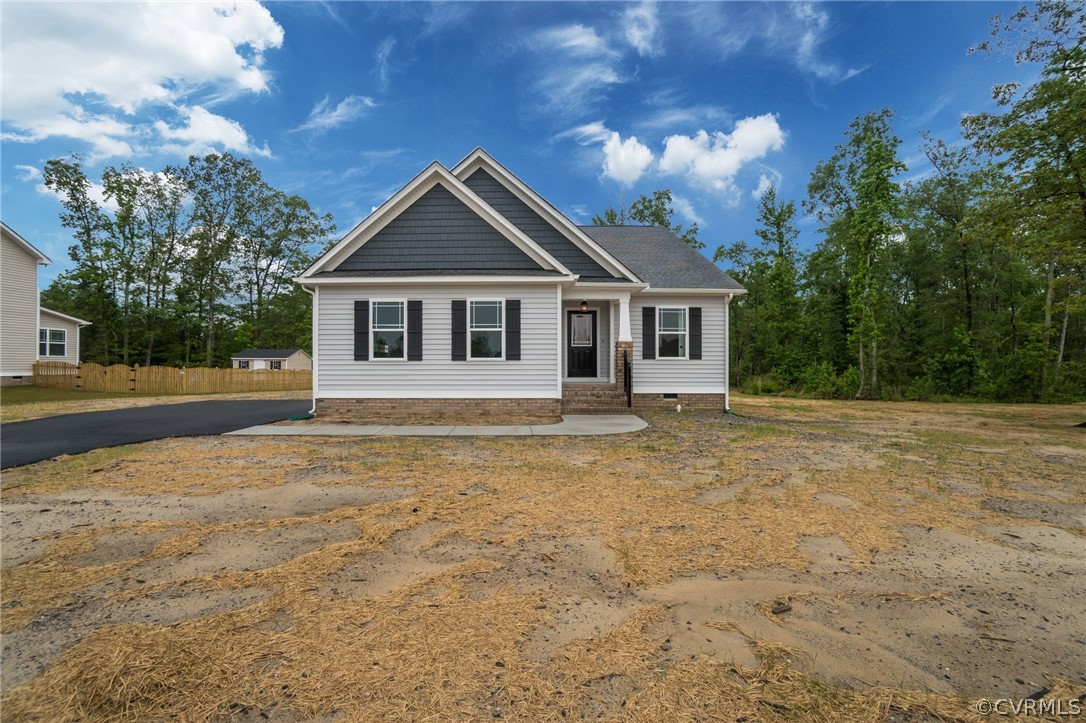 a front view of a house with yard