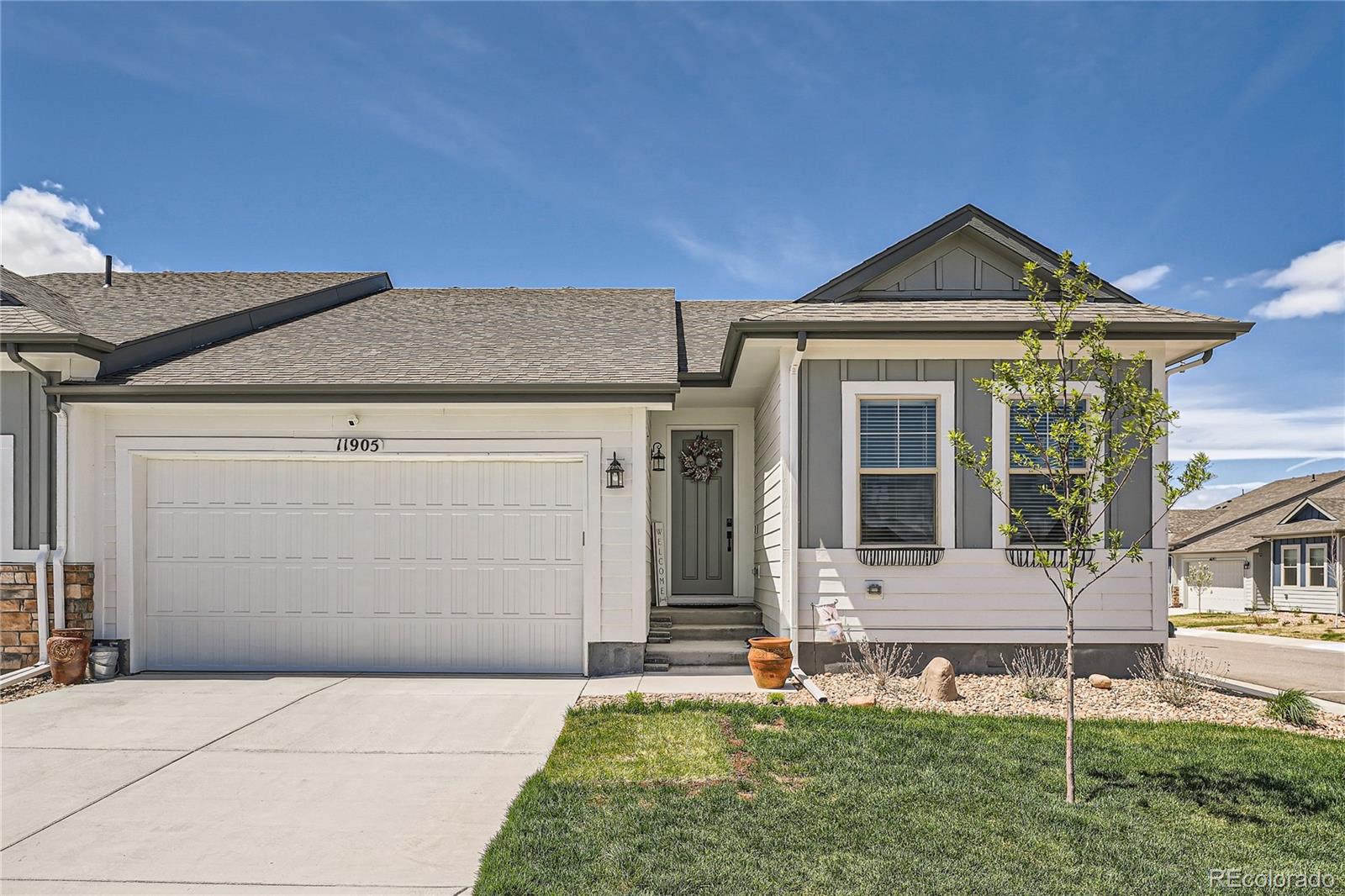 front view of house with a yard