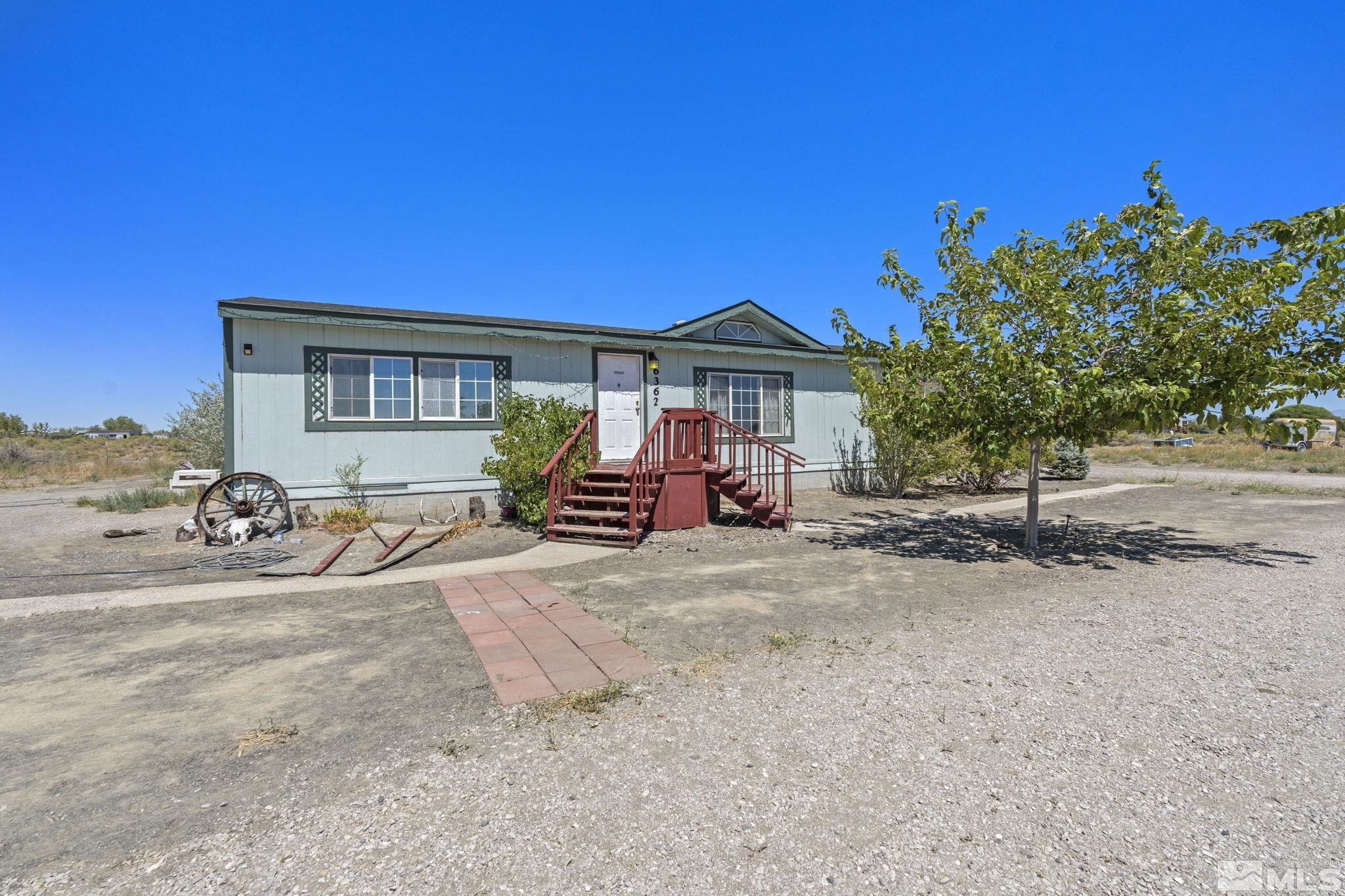 a view of a house with a patio