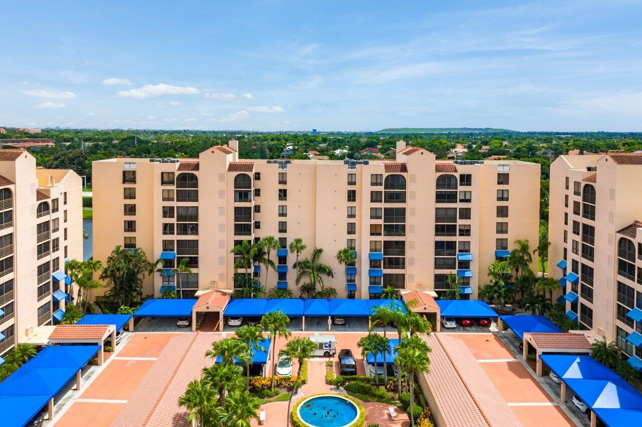 a view of swimming pool and outdoor seating