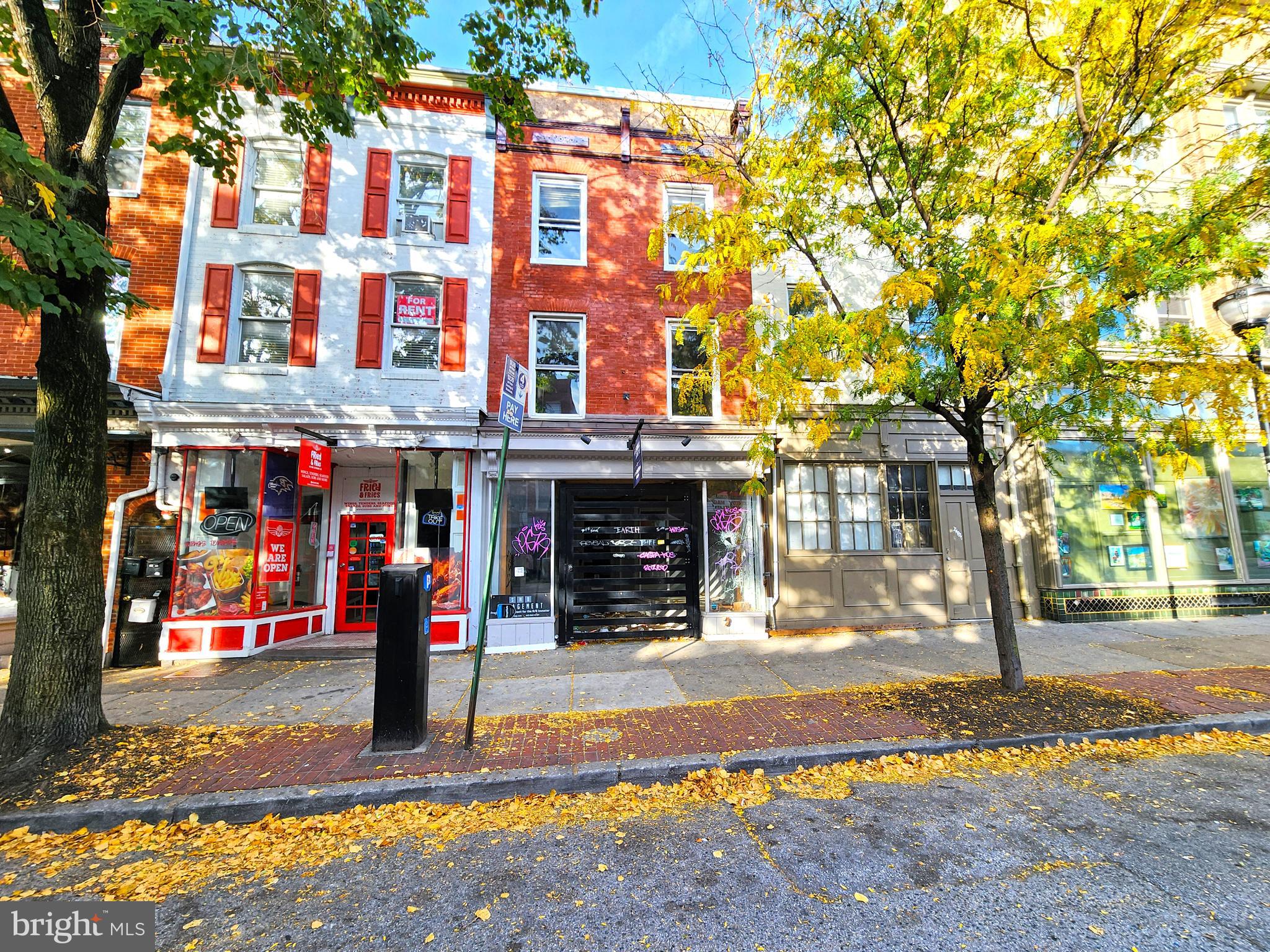 a front view of a building with street