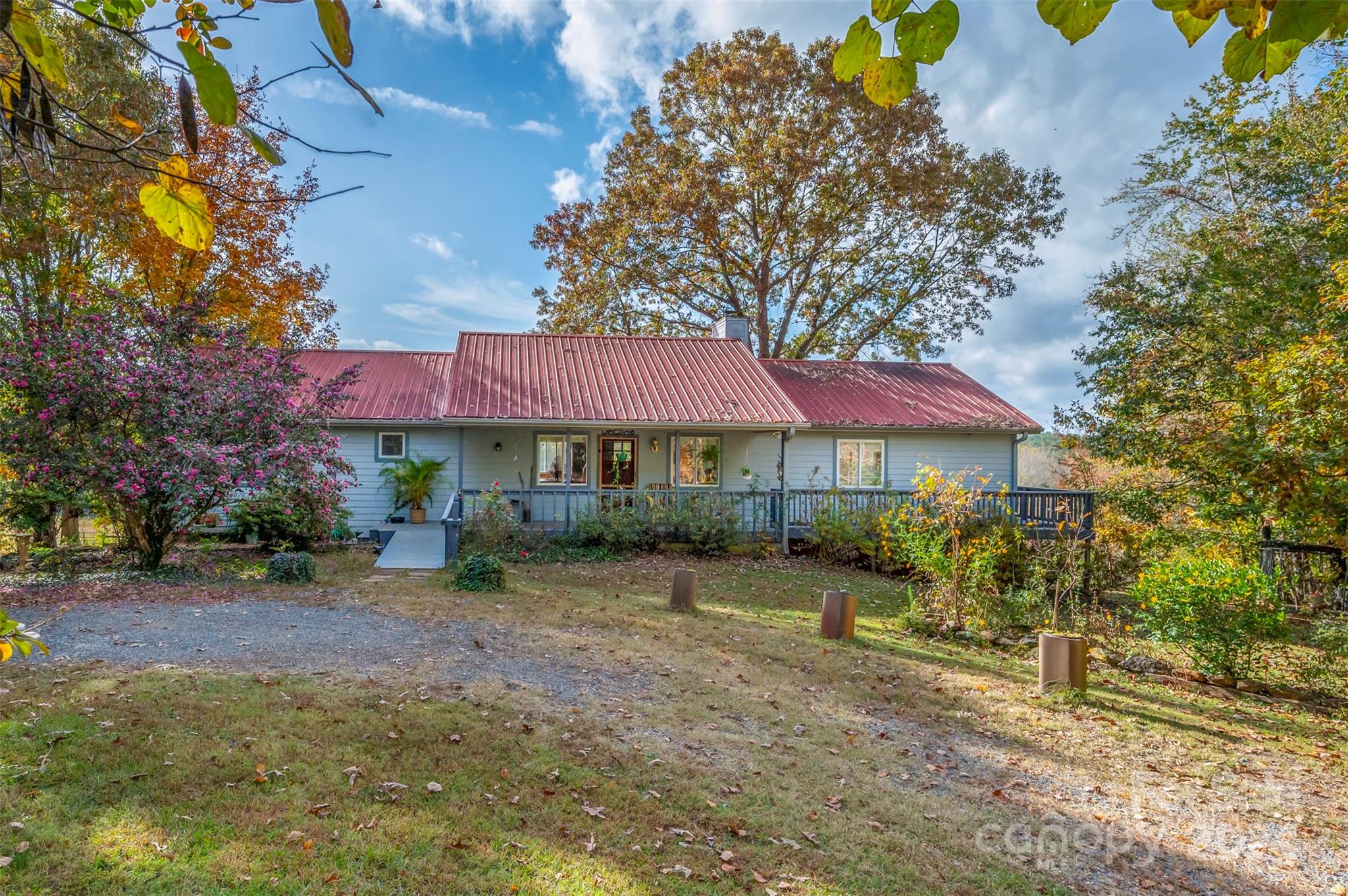 a front view of a house with garden