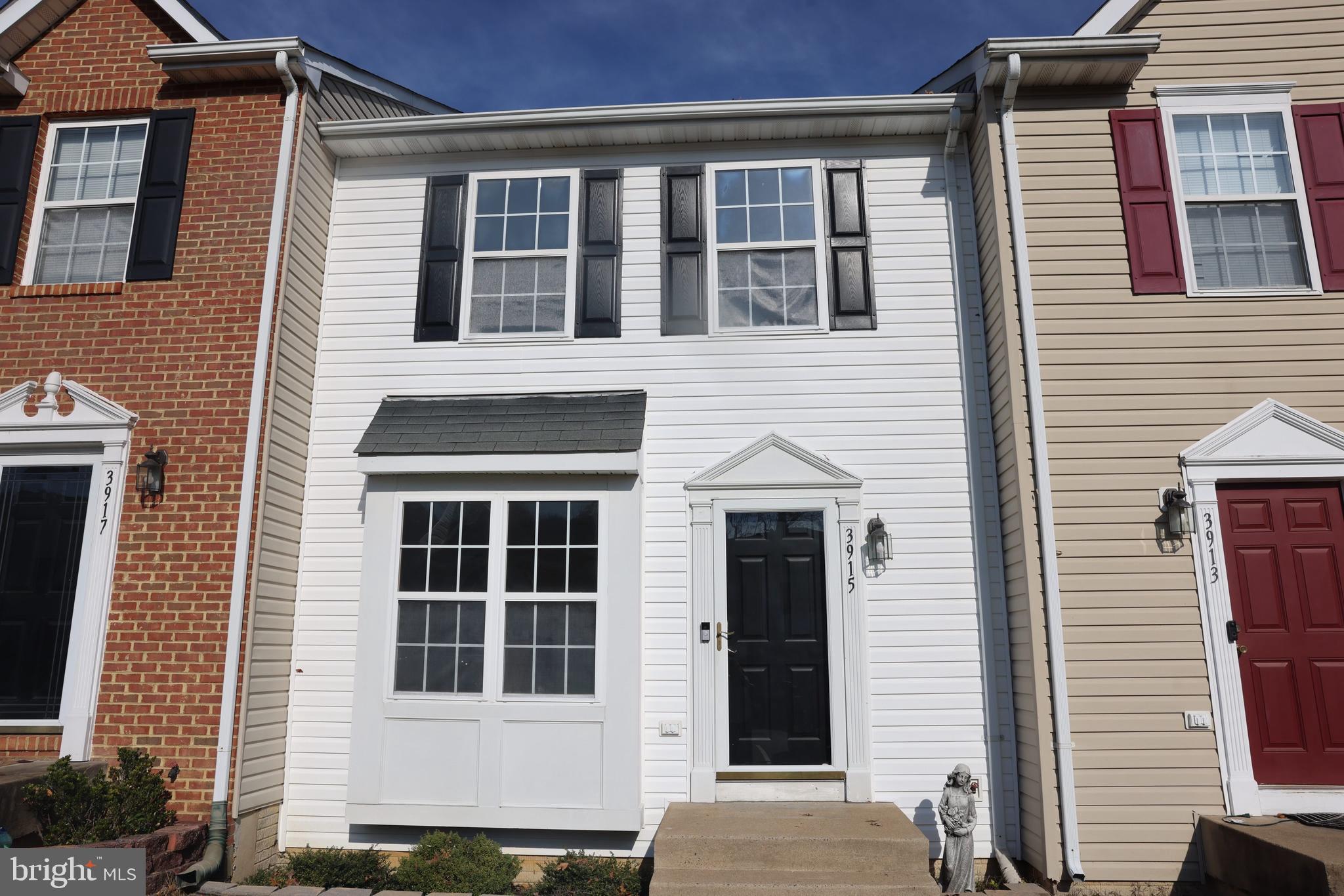 a front view of a house with windows