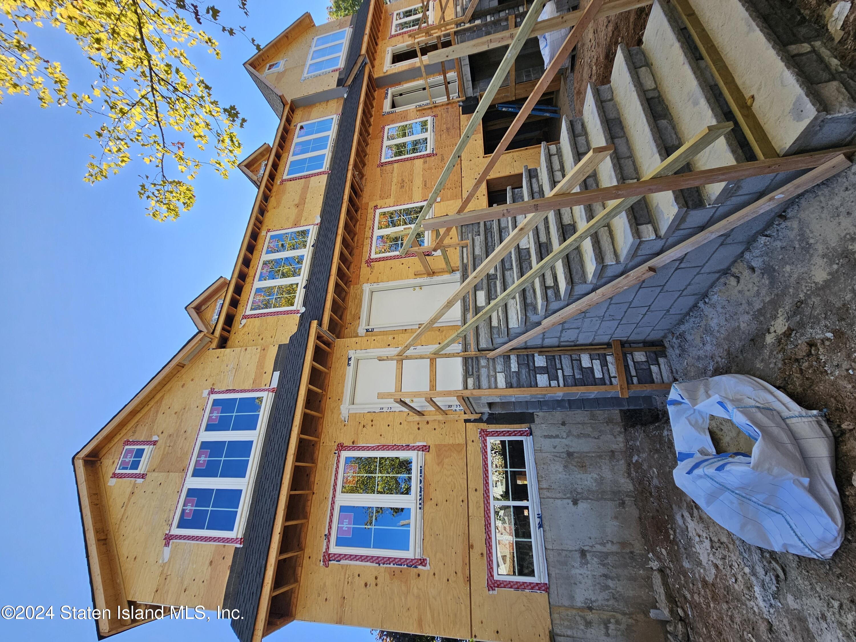 a front view of a multi story residential apartment building