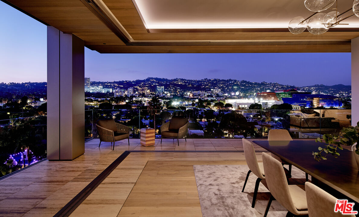 a view of a terrace with seating area