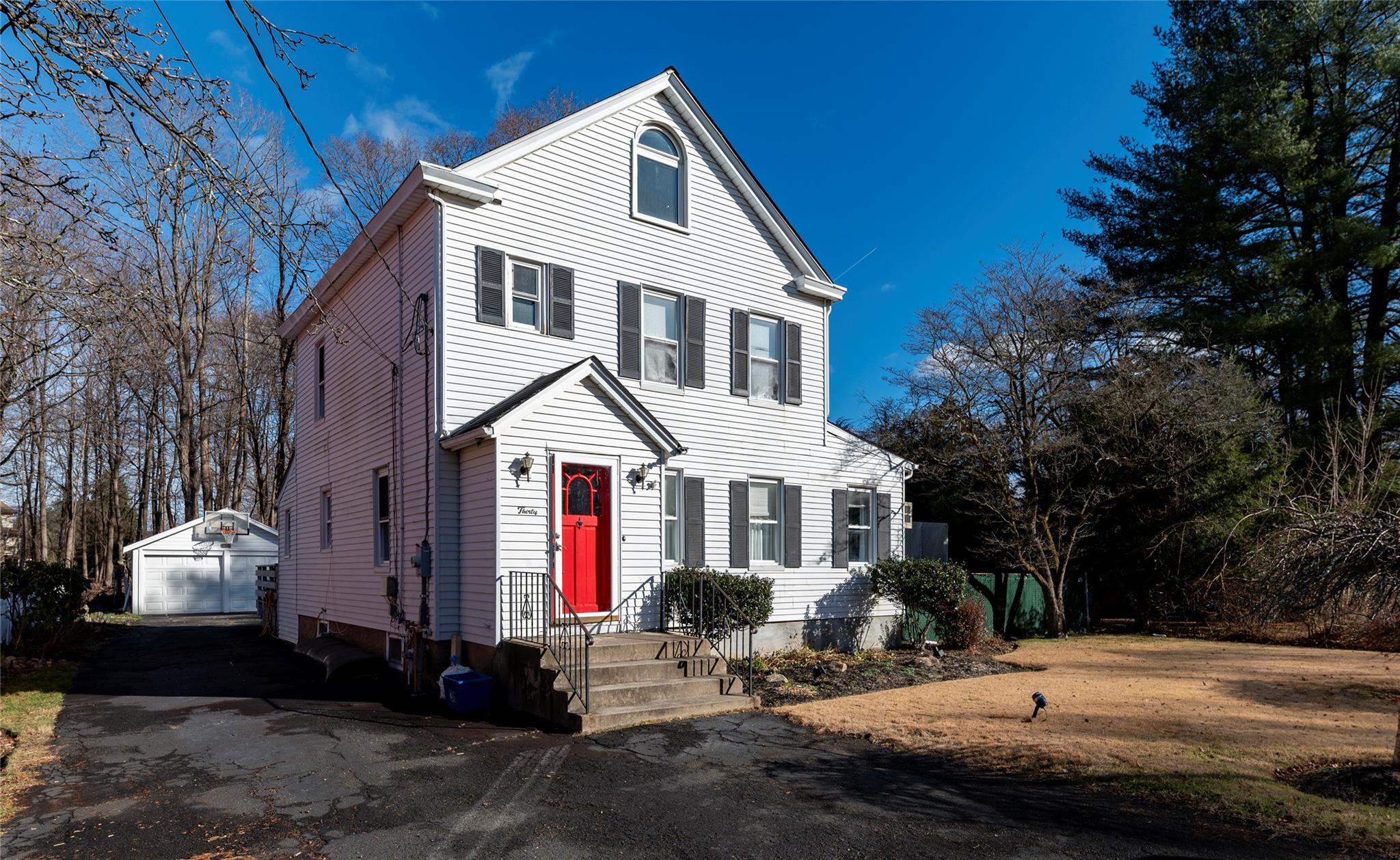 View of front of property with detached garage