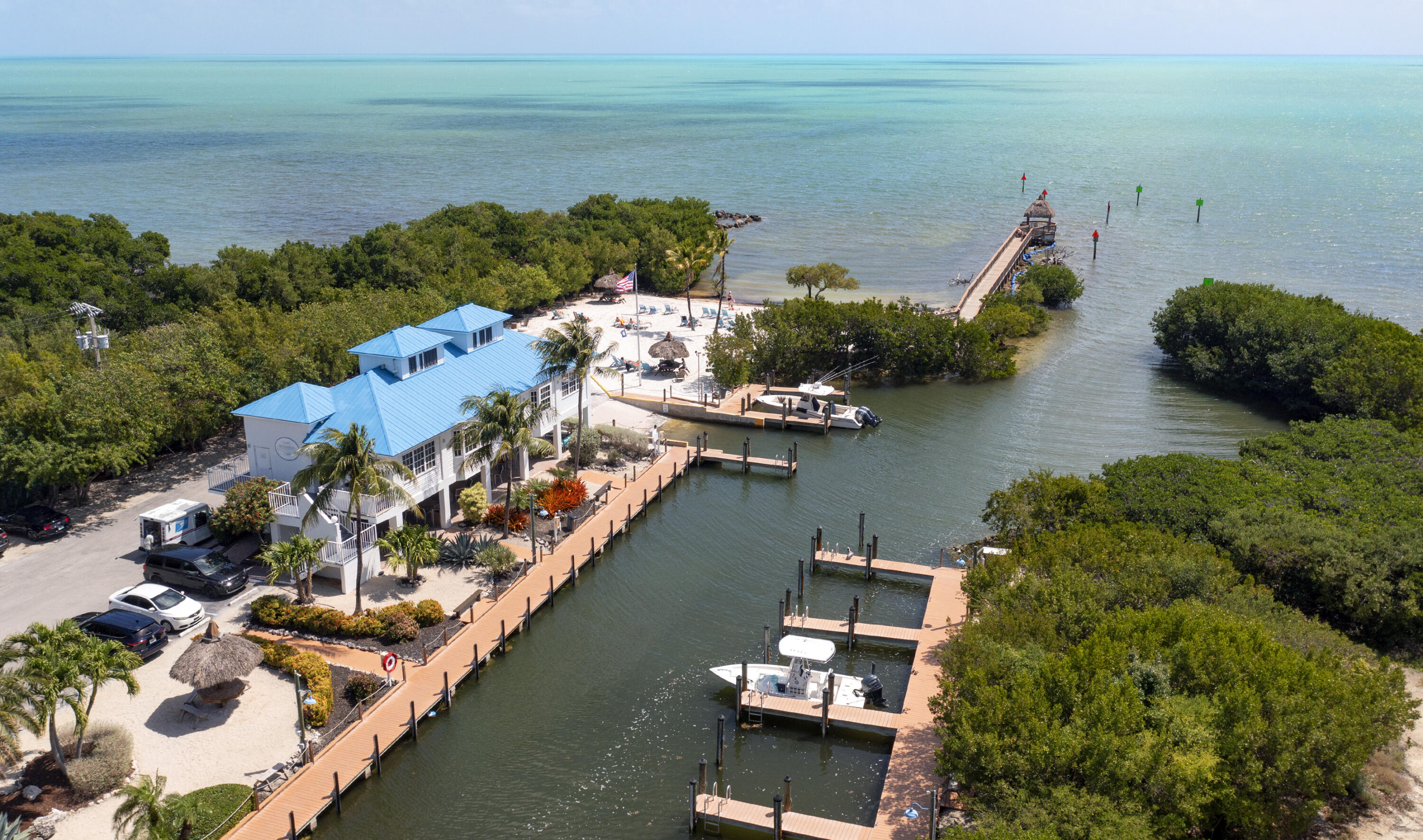 an aerial view of a house with a lake view