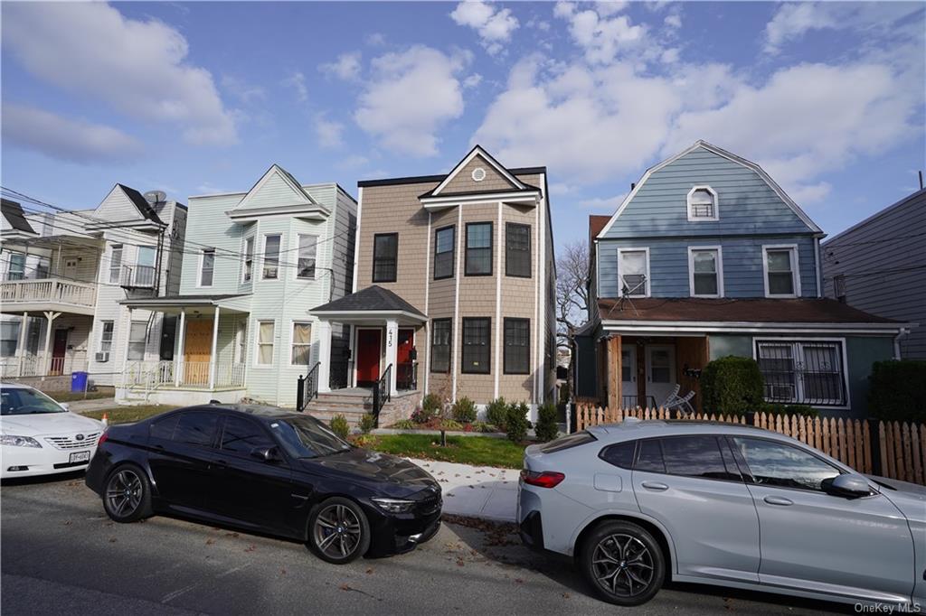 a car parked in front of a house