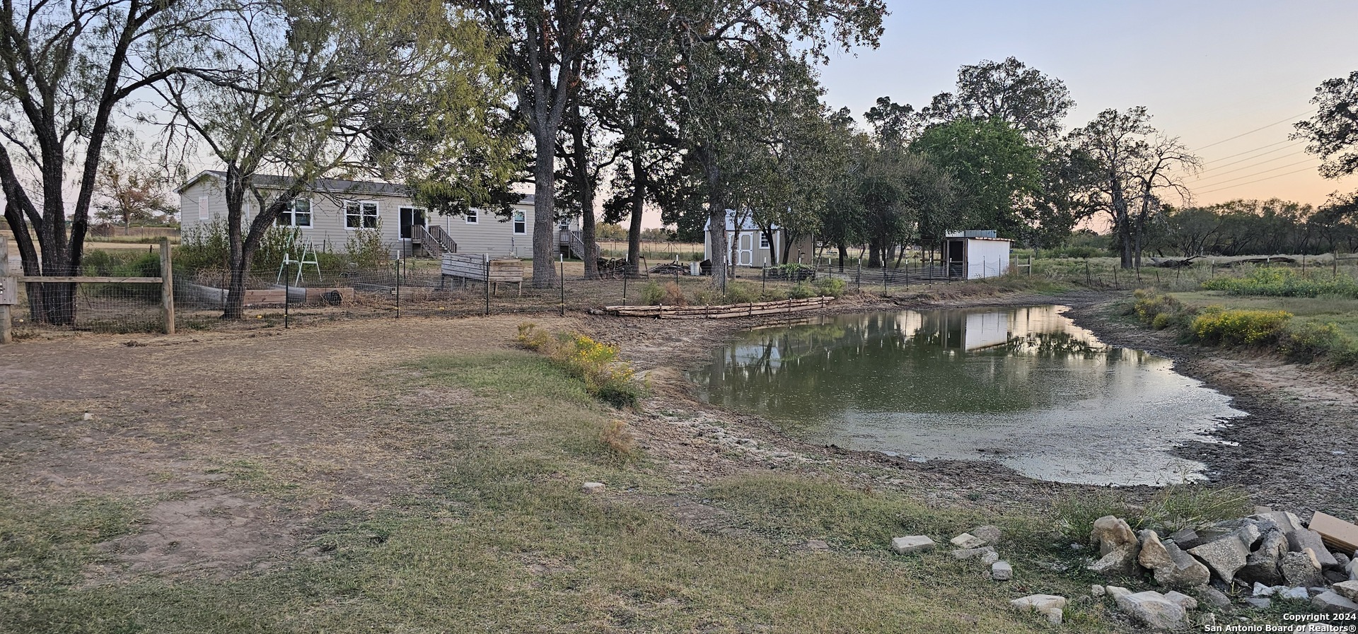 a view of a lake view with a fountain