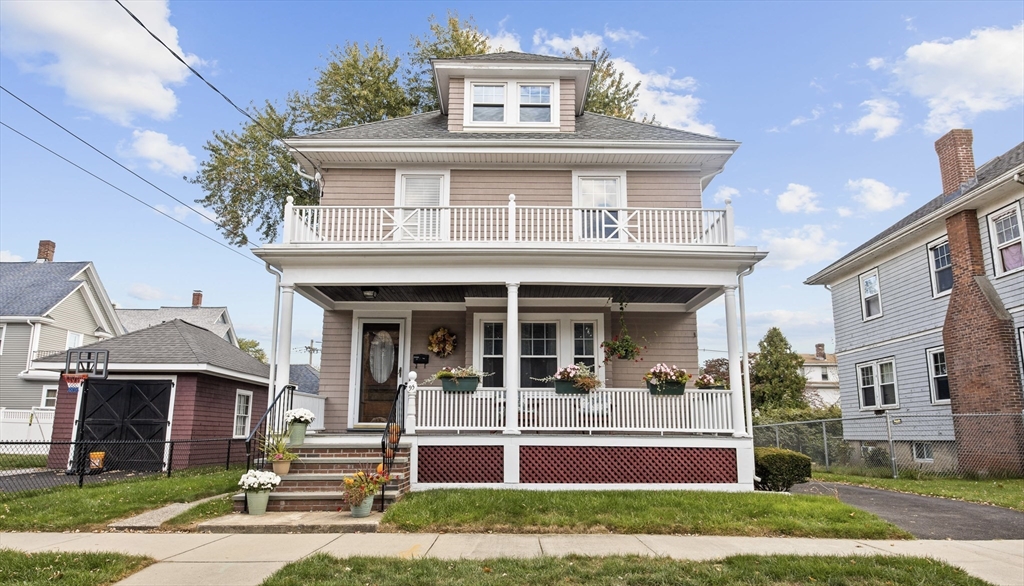 a front view of a house with a porch