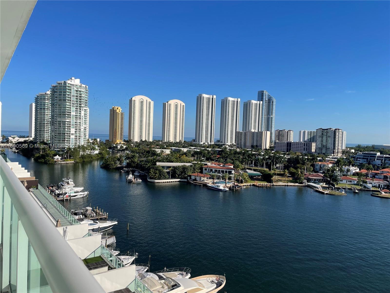 a view of a city with tall buildings