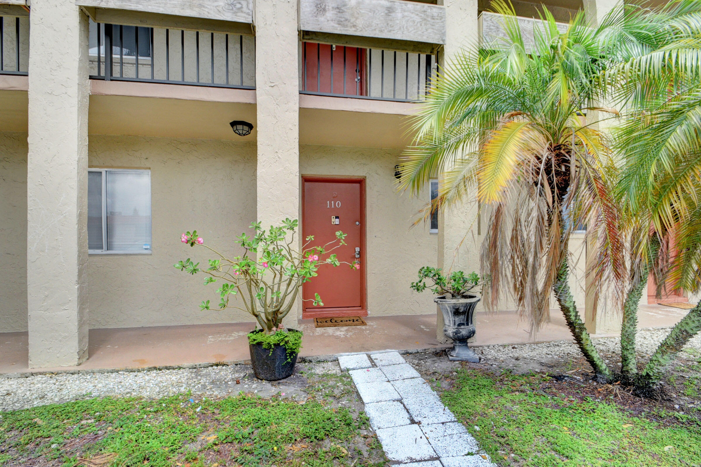 a front view of a house having yard