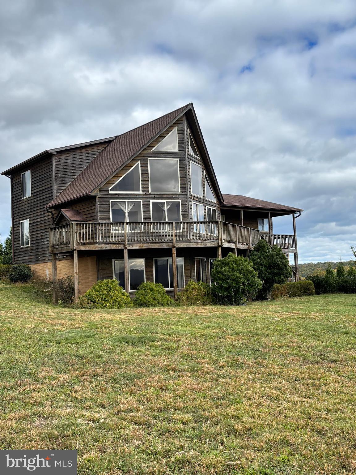 a front view of a house with swimming pool