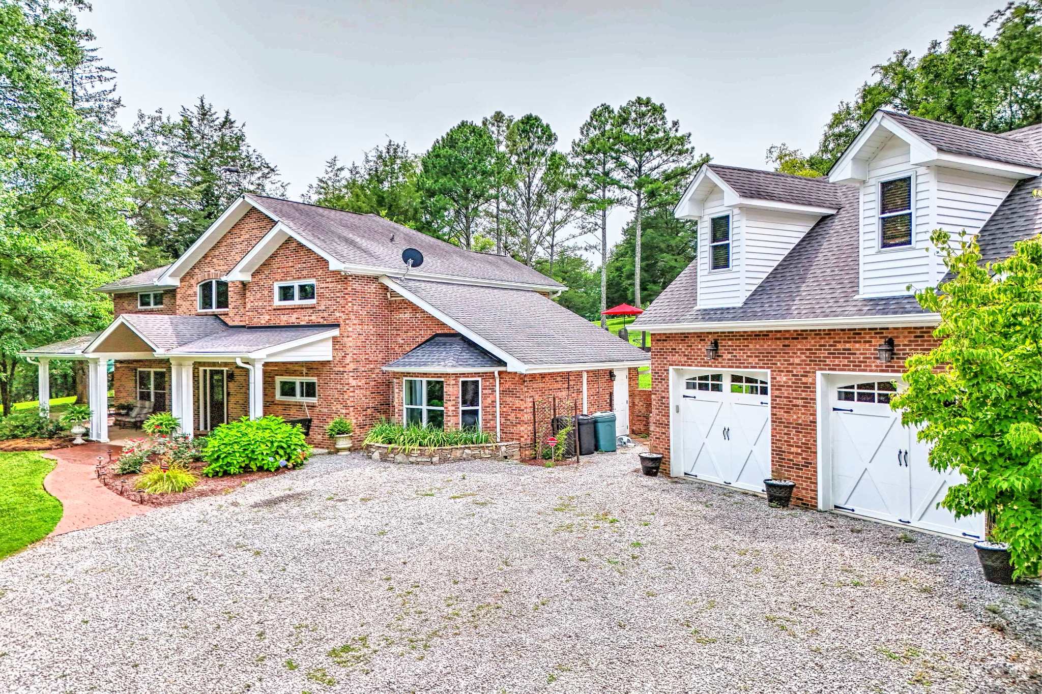 front view of a house with a yard