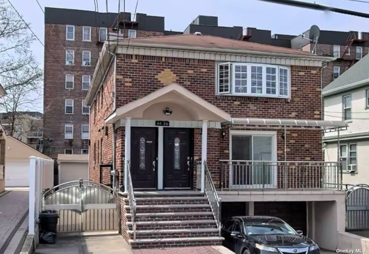 a front view of a house with a porch