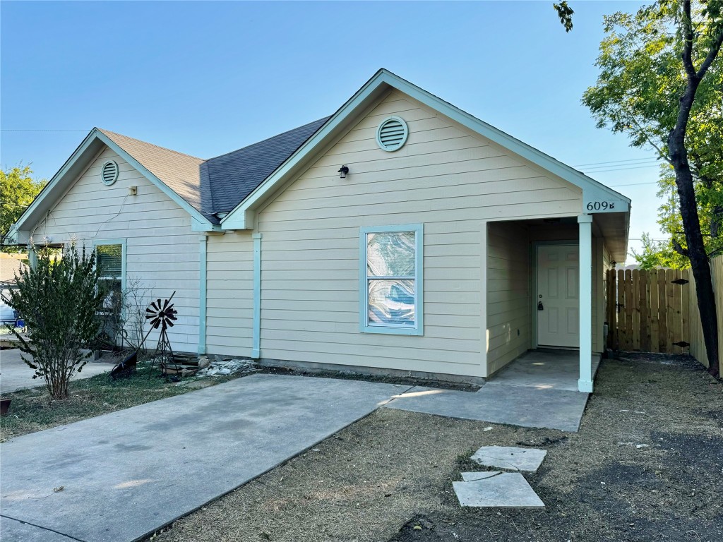 a view of backyard of house