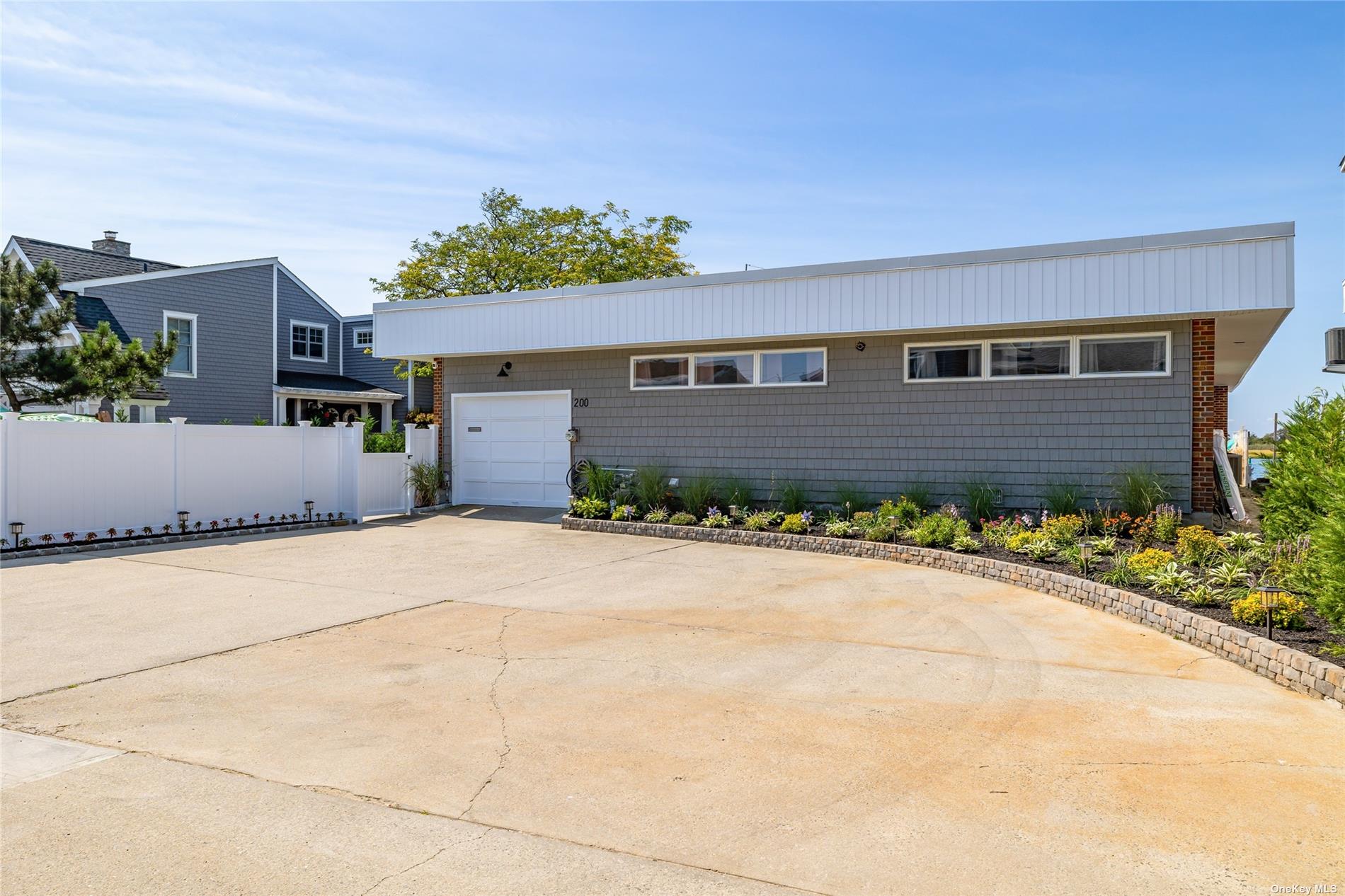 front view of a house and a yard