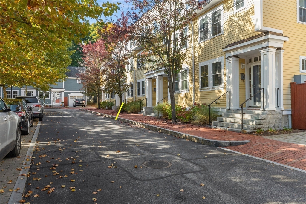 a view of a road with a building in the background