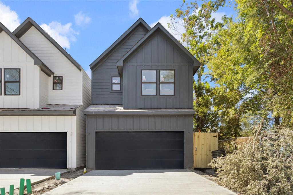 a front view of a house with a garage