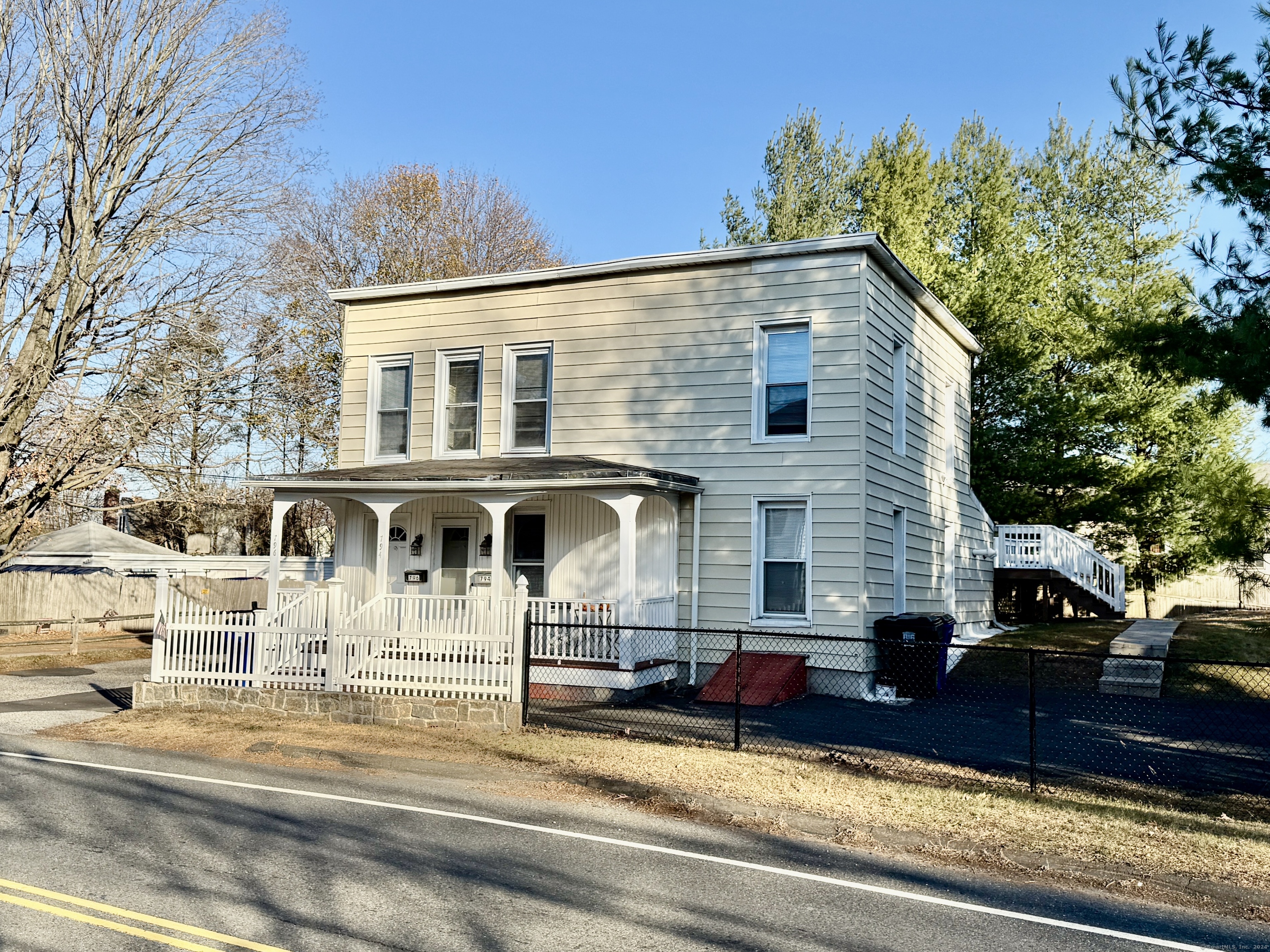 a view of a house with a small garden