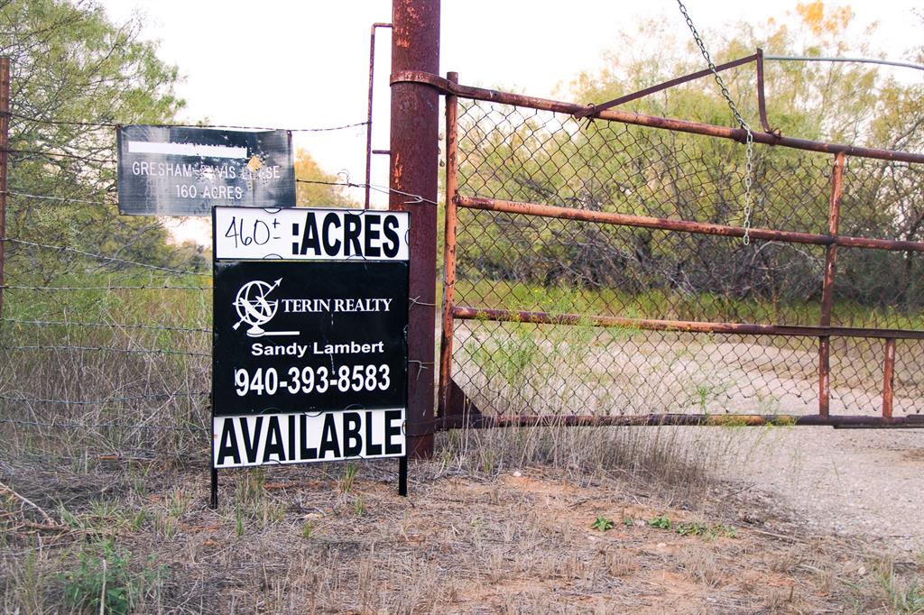 a view of a sign under a street