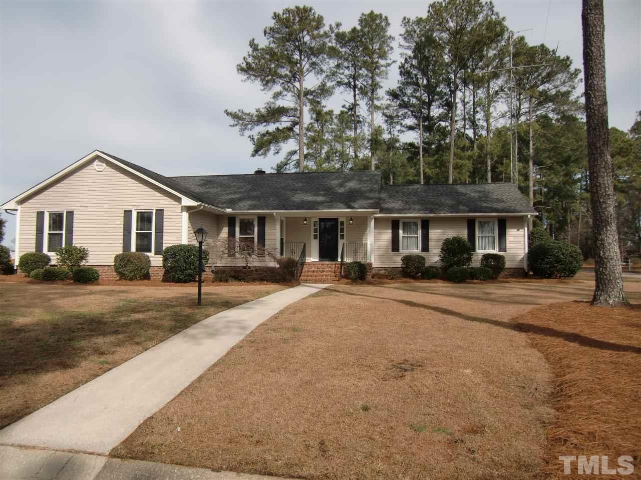 front view of a house with a patio