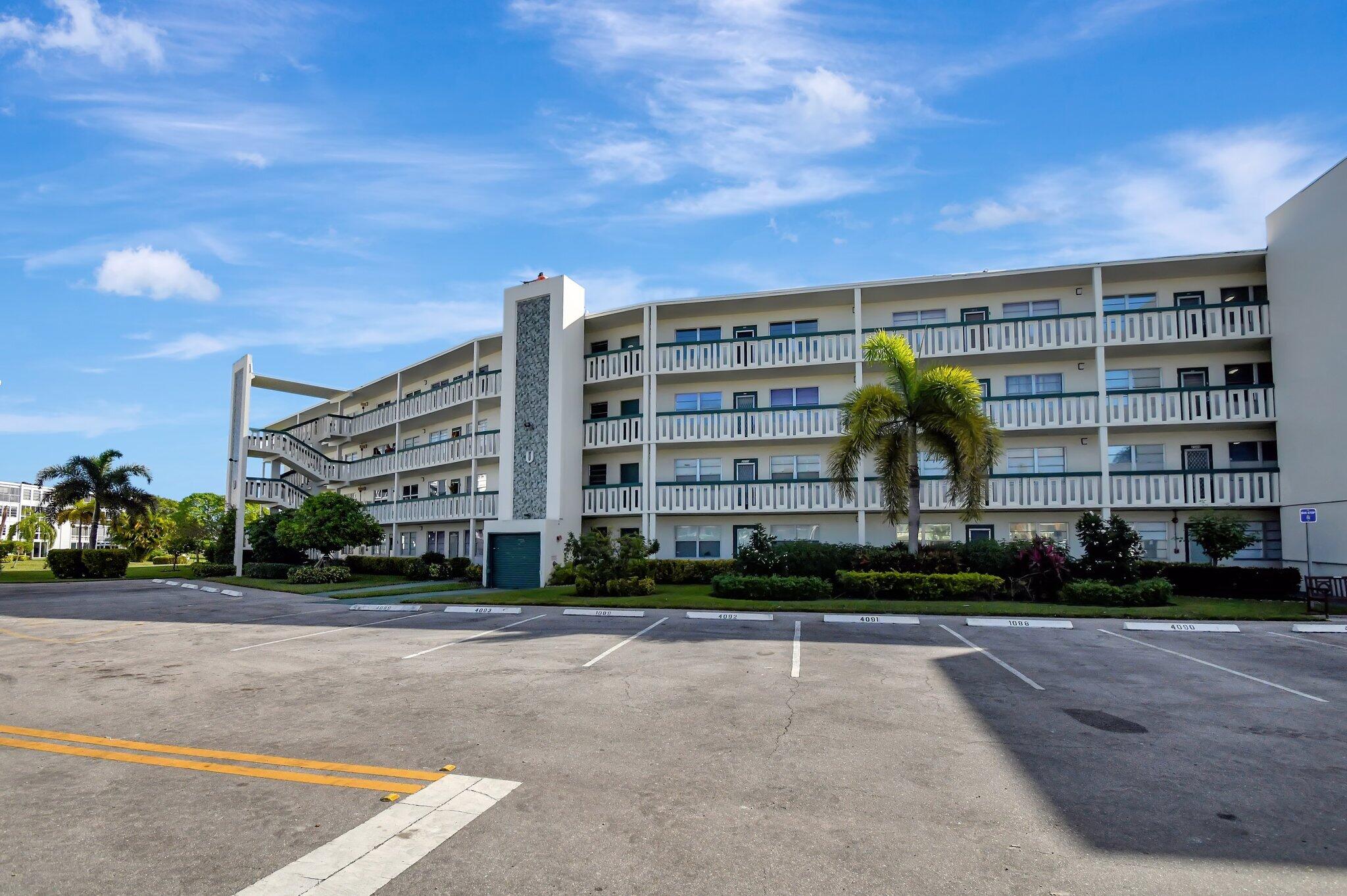 a front view of building with yard