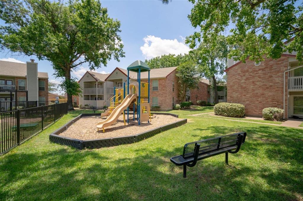 a swimming pool with outdoor seating and yard