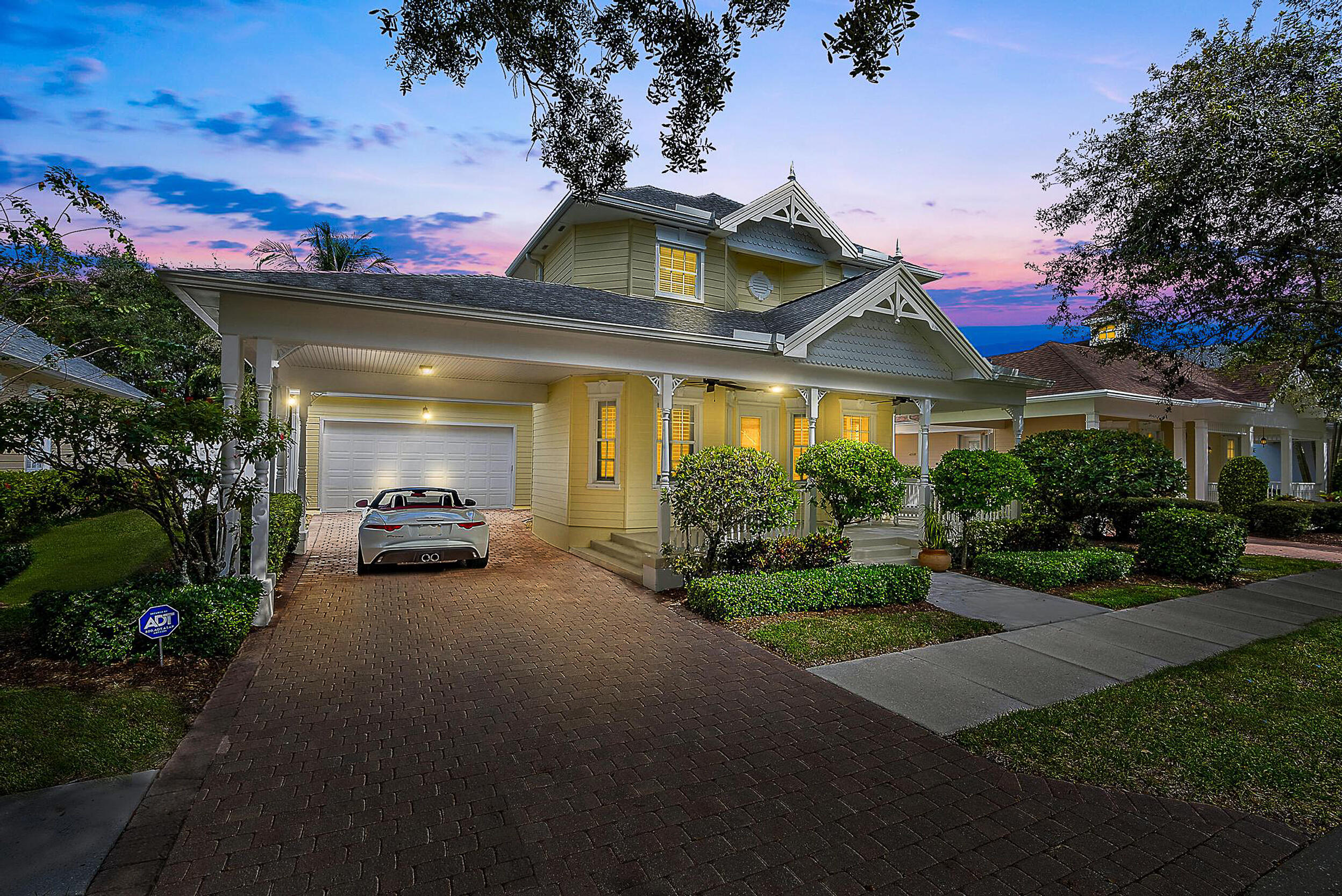 a view of a car park in front of house